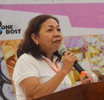 Dr. Julieta R. Roa of PhilRootcrops, VSU, welcomes and orients the guests and participants about the SP-ISP Business Launch and Product Exhibit's overview and rationale. (Image Credit: Joel Norman R. Panganiban, Crops Research Division (CRD), DOST-PCAARRD)